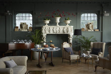 green painted wall white fireplace