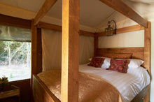 four poster wooden bed